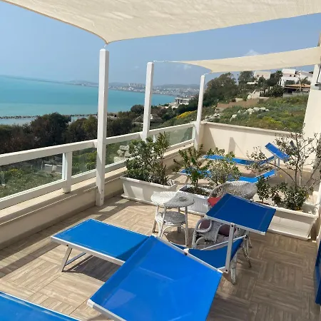 Locazione Turistica Il Tucano Couette-café